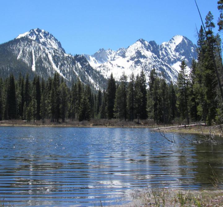 Lake with mountains in the background
