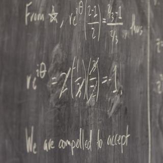 Math formulas on a chalkboard