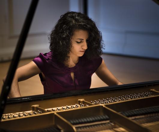 Student performs on the piano