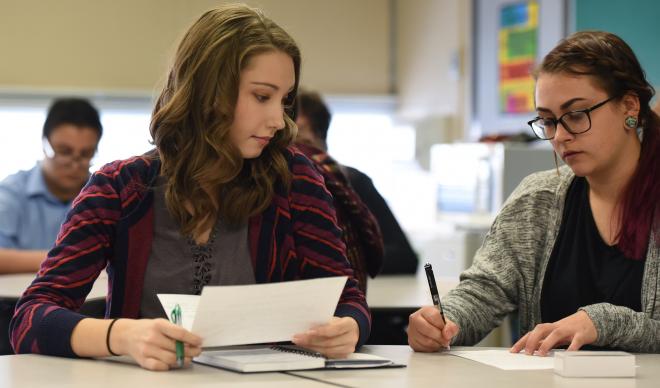 Two C of I students in EDU-300 work together on an assignment at Idaho Digital Learning Academy.