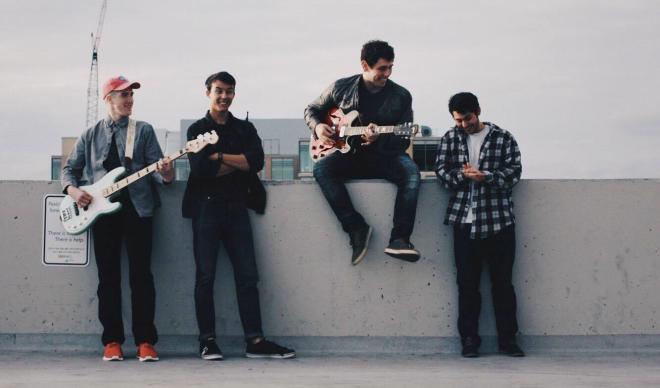 Town of Trees poses with their instruments.