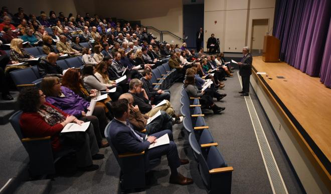 Dr. Bob Hoover delivers his State of the College address to staff and faculty in the Langroise Recital Hall.