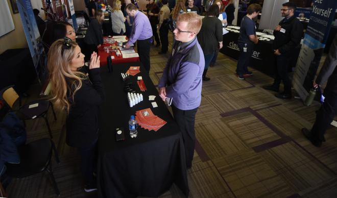 College of Idaho students speak with representatives at the Career & Internship Expo.