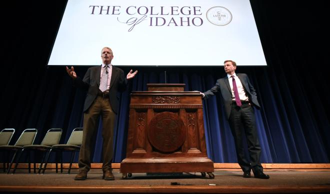 Jim Everett (left) and Doug Brigham (right) stand together at a presentation on Feb. 16.