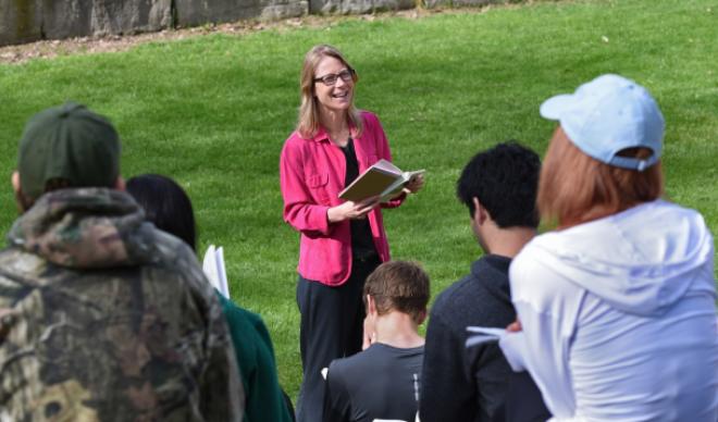 Dr. Rochelle Johnson teaches students outside on the College of Idaho campus.