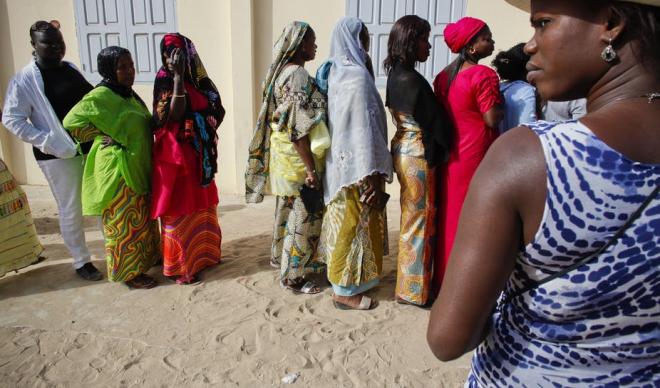 Senegalese women queuing to vote at a polling station in Dakar.