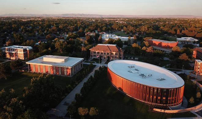An aerial shot of The College of Idaho at sunrise.