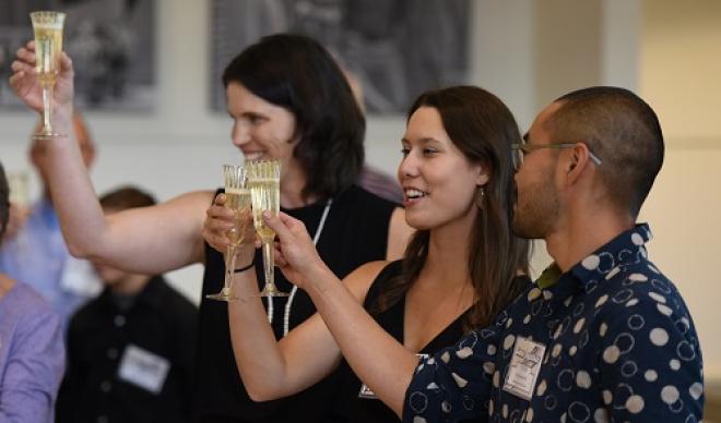 Distinguished Alumni Award winners raise a toast during their awards ceremony at Homecoming 2018.