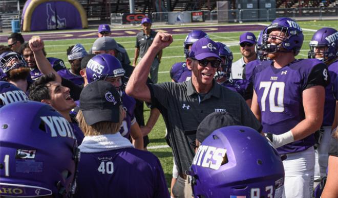 Coach Moroski with the football team