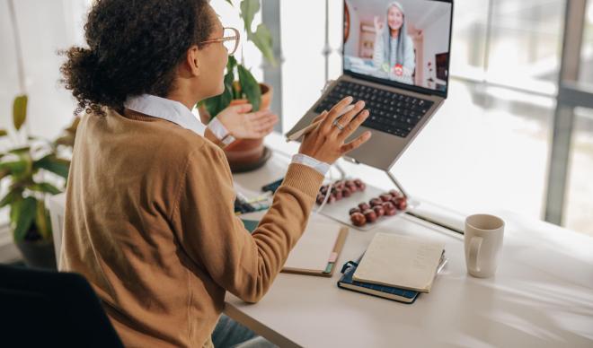 a student in video conference with a faculty member 