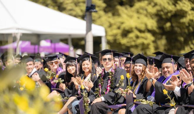 2025 Commencement Students Sitting 