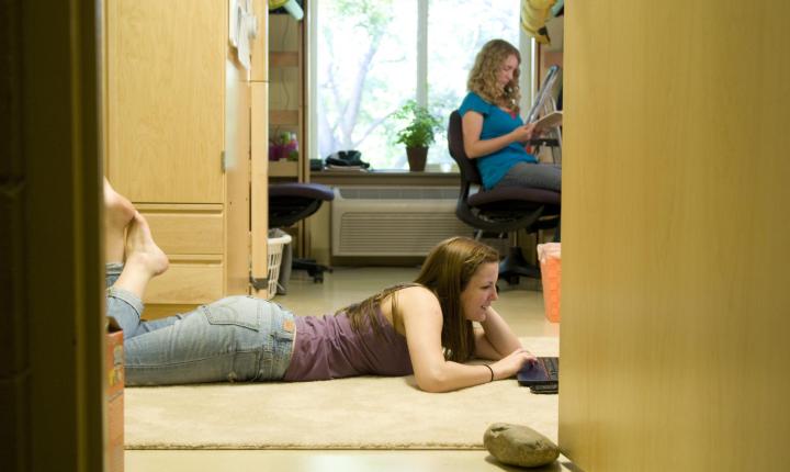 girls studying in residence hall room