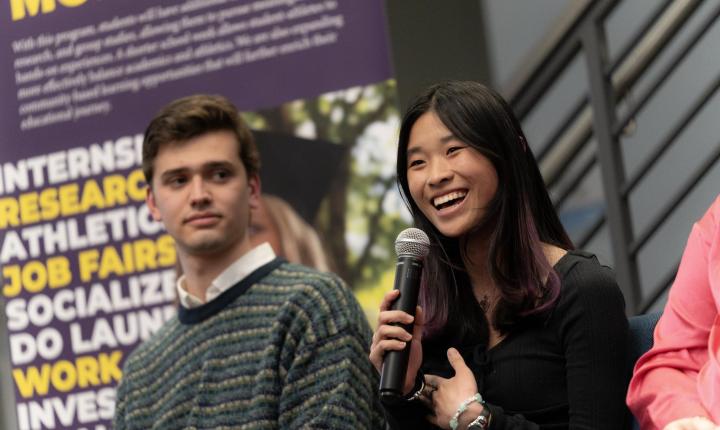 students speaking at event