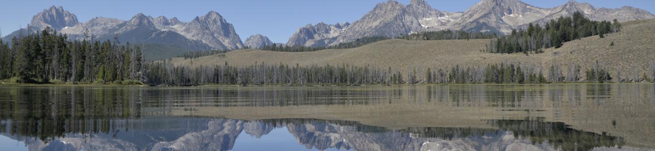 Scenic photo of lake/mountains