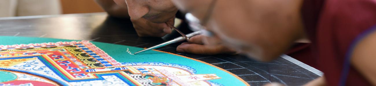 Tibetan monks create a sand mandala