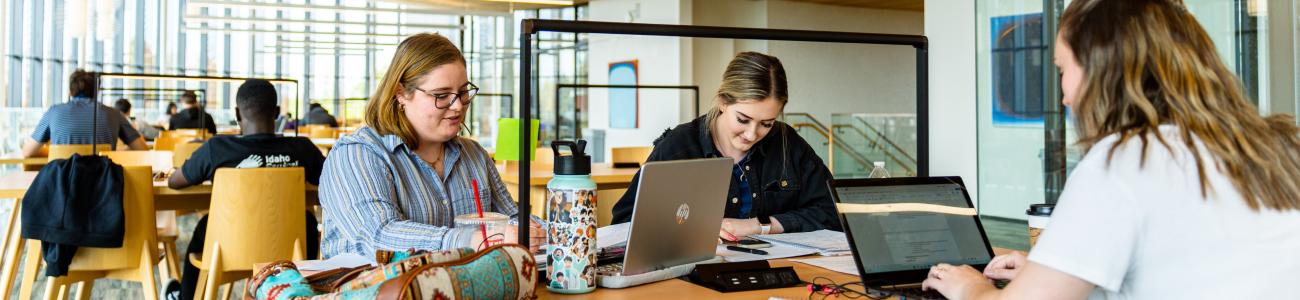 students studying int he library